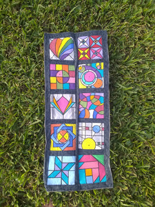 "Vertical" stained glass designed wall hanging.